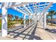White pergola walkway with benches at 534 Juniper Dr. # 534, Myrtle Beach, SC 29577