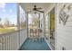 Balcony with seating and a view of the golf course at 565 White River Dr. # 10-E, Myrtle Beach, SC 29579