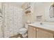 Clean bathroom with shower/tub, vanity, and updated fixtures at 565 White River Dr. # 10-E, Myrtle Beach, SC 29579