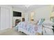 Bedroom with a queen-size bed, TV, and access to a bathroom at 565 White River Dr. # 10-E, Myrtle Beach, SC 29579