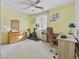 Home office with desk, chair, exercise bike, and built-in dresser at 565 White River Dr. # 10-E, Myrtle Beach, SC 29579