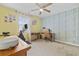 Bright home office features a workspace and exercise equipment at 565 White River Dr. # 10-E, Myrtle Beach, SC 29579