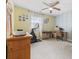 Home office with desk, chair, and exercise bike at 565 White River Dr. # 10-E, Myrtle Beach, SC 29579