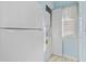 Laundry closet with a washer and dryer, and a window at 565 White River Dr. # 10-E, Myrtle Beach, SC 29579