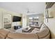 Living room featuring a sectional sofa and access to main bedroom at 565 White River Dr. # 10-E, Myrtle Beach, SC 29579