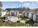 Relaxing community pool and hot tub area at 565 White River Dr. # 10-E, Myrtle Beach, SC 29579