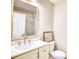 Simple bathroom with white vanity, single sink, and a toilet at 5816 Woodside Ave., Myrtle Beach, SC 29577
