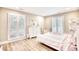 bedroom with a full-size bed, white dresser and window shutters at 5816 Woodside Ave., Myrtle Beach, SC 29577