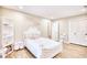 Bright bedroom with white furniture and access to a hallway at 5816 Woodside Ave., Myrtle Beach, SC 29577