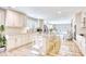 Open concept kitchen with island and view to living area at 5816 Woodside Ave., Myrtle Beach, SC 29577