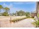 Landscaped yard with brick walkway and side yard view at 5816 Woodside Ave., Myrtle Beach, SC 29577