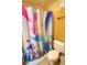 Bathroom with mermaid-themed shower curtain at 5905 S Kings Hwy. # 217-C, Myrtle Beach, SC 29575