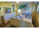 Coastal-themed bedroom with white dresser and full-size bed at 5905 S Kings Hwy. # 217-C, Myrtle Beach, SC 29575
