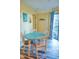 Charming dining area with a round table and chairs at 5905 S Kings Hwy. # 217-C, Myrtle Beach, SC 29575