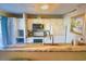 Clean kitchen, granite counters, white cabinets at 5905 S Kings Hwy. # 217-C, Myrtle Beach, SC 29575