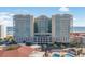 Oceanfront building, Mar Vista Grande, with multiple balconies and a pool at 603 S Ocean Blvd. # 1103, North Myrtle Beach, SC 29582