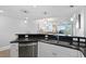Modern kitchen with stainless steel appliances and granite countertops at 603 S Ocean Blvd. # 1103, North Myrtle Beach, SC 29582