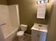 Clean bathroom with a shower/tub combo, toilet and vanity at 615 Carter Ln. # B4, Conway, SC 29526