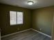 Small bedroom with vinyl flooring and window at 615 Carter Ln. # B4, Conway, SC 29526
