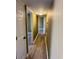 Hallway with light-colored walls and flooring at 615 Carter Ln. # B4, Conway, SC 29526