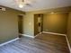 Spacious living area with wood-look flooring at 615 Carter Ln. # B4, Conway, SC 29526