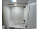 Clean bathroom with a bathtub and shower at 7200 N Ocean Blvd. # 1460, Myrtle Beach, SC 29577