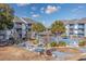 View of community pool and surrounding area at 7700 Porcher Dr. # 4202, Myrtle Beach, SC 29572