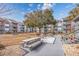 Community courtyard with picnic tables and benches at 7700 Porcher Dr. # 4202, Myrtle Beach, SC 29572