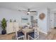 Dining area with a table for four and kitchen pass-through at 7700 Porcher Dr. # 4202, Myrtle Beach, SC 29572