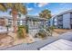 Relaxing gazebo with steps leading down at 7700 Porcher Dr. # 4202, Myrtle Beach, SC 29572