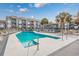 Refreshing community pool with sundeck at 7700 Porcher Dr. # 4202, Myrtle Beach, SC 29572