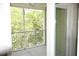 Screened balcony overlooking lush trees and landscape at 81 Delray Dr. # 2-C, Murrells Inlet, SC 29576