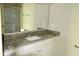 Bathroom boasts granite countertop, white cabinets, and a shower at 81 Delray Dr. # 2-C, Murrells Inlet, SC 29576