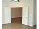 Spacious bedroom with double doors leading to another room at 81 Delray Dr. # 2-C, Murrells Inlet, SC 29576