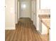Light and bright hallway with wood-look floors at 81 Delray Dr. # 2-C, Murrells Inlet, SC 29576