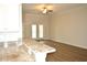 Open living room and kitchen area with hardwood floors and granite countertops at 81 Delray Dr. # 2-C, Murrells Inlet, SC 29576