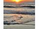Stunning sunrise over the ocean waves at 81 Delray Dr. # 2-C, Murrells Inlet, SC 29576