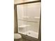 Large walk-in shower with glass enclosure and built-in seat at 81 Delray Dr. # 2-C, Murrells Inlet, SC 29576
