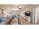 Spacious living area with comfortable seating and a large TV at 81 Delray Dr. # 3-B, Murrells Inlet, SC 29576