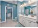 Main bathroom with double vanity, large mirror, and walk-in shower at 840 San Marco Ct. # D, Myrtle Beach, SC 29579