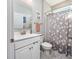 Bathroom with shower/tub combo and floral shower curtain at 840 San Marco Ct. # D, Myrtle Beach, SC 29579