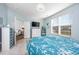 Bedroom with large window, dresser and TV at 840 San Marco Ct. # D, Myrtle Beach, SC 29579