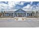Community clubhouse with ample parking and welcoming exterior at 840 San Marco Ct. # D, Myrtle Beach, SC 29579