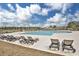 Relaxing community pool area with plenty of lounge chairs at 840 San Marco Ct. # D, Myrtle Beach, SC 29579