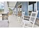 Relaxing community clubhouse porch with rocking chairs at 840 San Marco Ct. # D, Myrtle Beach, SC 29579