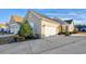 Tan colored house with a two-car garage and landscaping at 840 San Marco Ct. # D, Myrtle Beach, SC 29579
