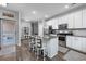 Modern kitchen with island, stainless steel appliances, and granite countertops at 840 San Marco Ct. # D, Myrtle Beach, SC 29579