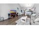 Open living room with hardwood floors, entertainment center, and comfortable seating at 840 San Marco Ct. # D, Myrtle Beach, SC 29579