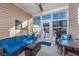 Relaxing sunroom with wicker furniture and access to patio at 840 San Marco Ct. # D, Myrtle Beach, SC 29579