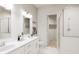 Bathroom with double vanity, walk-in closet, and shower at 898 Foxtail Dr. # D-42, Longs, SC 29568